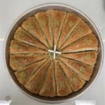 ANTEPZADE BAKLAVA TRIANGLE DOUBLE PISTACHIOS ROUND TRAY 2000 GR (16 SLICES) 490080INA